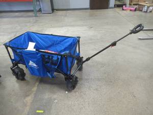 lot 609 image: Ozark Trail Camping All-terrain Folding Wagon with Oversized Wheels, Blue - SOLD AS IS
