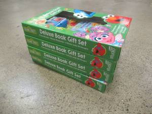lot 646 image: (4) Sesame Street Deluxe Book Gift Set With Projector - New (Some Packaging May be Damaged  - SOLD AS IS