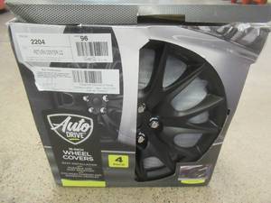 lot 661 image: Package of (4) 16 Wheel Covers in Black - NEW SOLD AS IS