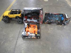 lot 716 image: Trucks and RC Cars, Open Box - SOLD AS IS