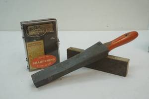 lot 13 image: sharpening stone