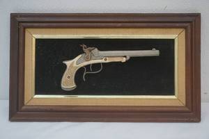 lot 154 image: Frame displayed replica Pirate Gun