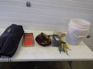 Tent, Pail with Supplies, Tent Stakes