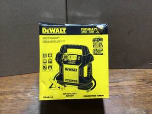 lot 90 image: DEWALT 1400 Peak Amp Portable Car Jump Starter with Digital Compressor