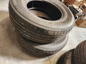 lot 56 image: Lot of (2) Bridgestone Dueler HT P25570R17 Tires