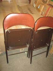 2 padded folding chairs ...