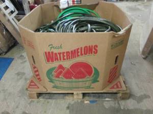 pallet of garden hoses ...