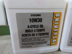 lot 39 image: 2 Cases of Universal 10W30 4-Cycle Oil