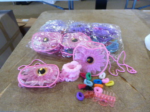 lot 391 image: 12 Cases of Hair Binders and Clips