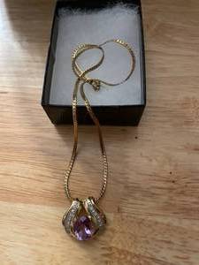 Gold Tone Necklace With Diuamond Around An Amethyst Stone 925