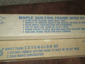 In original box is a wooden quilt f...