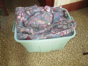 Covered tote of curtains and tie ba...