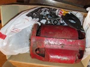 Shoebox containing an antique metal...