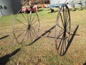 Antique 48 Metal wagon wheels on a...