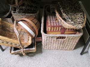 Heap of wicker baskets, planters an...