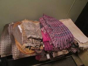 Lot of rugs, tablecloths and more...