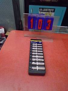 lot 103 image: 9 piece Gear Head 12 drive deep sockets that hold 6 different styles of bolt heads. As shown.