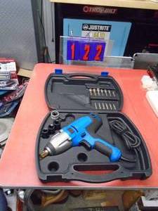 lot 122 image: Master Craft 12 110 volt impact wrench. New in box but got rained on. As shown.