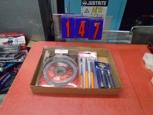 lot 147 image: Flat with 6 grinding wheels, chisels & allen wrenches. As shown.