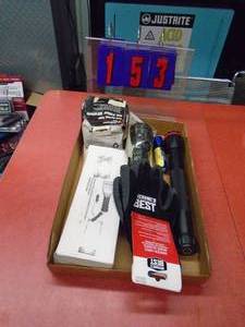 lot 153 image: Flat with electric windshield scraper, gloves & flashlights. As shown.
