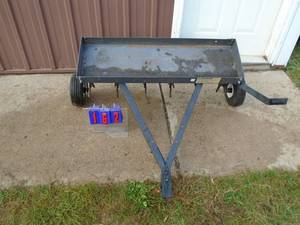lot 162 image: Plug lawn airator. Used condition but in good shape. As shown.
