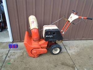lot 165 image: Simplicity snow blower. Used condition. Tested & works. As shown.