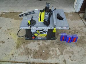 lot 175 image: Evolv by Craftsman table saw with legs. Appears new but needs safety key for switch. As shown.
