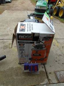lot 179 image: Rigid wet dry vac. Looks new in box but wont power up. As shown.