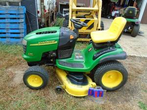 lot 183 image: John Deere L130 23 hp Kohler engine with hydrostatic drive. 48 deck. Needs new battery. starts, runs, drives. We think the deck will not engage due to weak battery. THIS ITEM HAS A RESERVE.