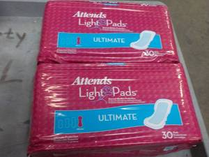 lot 193 image: 2 Pkgs 30 ct each Attends Light Pad...