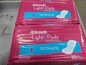 lot 194 image: 2 Pkgs 30 ct each Attends Light Pad...