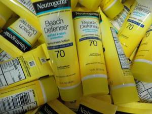 lot 217 image: Banana Box Full of Neutrogena Beach...
