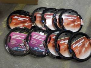 lot 286 image: 10 Steering Wheel Covers...
