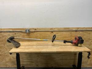 lot 82 image: HOMELITE Gas Powered String Trimmer