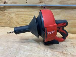 lot 104 image: MILWAUKEE M12 12-Volt Lithium-Ion Cordless Drain Snake Auger With 516 in. x 25 ft. Cable (Tool Only)