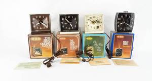 lot 12 image: Lot of 3 Vintage 1970s Stancraft The High Time Ceiling Clocks and 1 Vintage 1970s High Time Sentry Clock