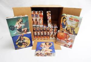 lot 61 image: Lot of 16 Gil Elvgren Taschen  Desk Calendars From 2001 to 2005