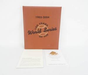 lot 41 image: 100 Years of the World Series 1903 - 2004 Limited Edition Leather Bound Book By Eric Enders