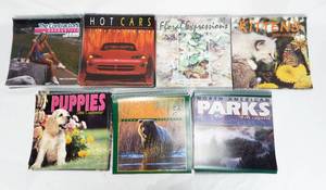 lot 101 image: Lot of 70 Assorted Vintage 1996 2024 Calendars