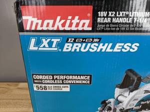 lot 10A image: Brand New Makita 18V X2 LXT 5.0Ah Lithium-Ion (36V) Brushless Cordless Rear Handle 7-14 in. Circular Saw Kit 