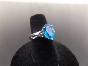 lot 33 image: .925 Sterling Silver Pear Cut Topaz Crystal Ring Size 6