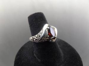 lot 56 image: .925 Sterling Silver Marquise Cut Garnet Scrolled Ring Size 7