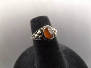 lot 59 image: .925 Sterling Silver Amber Cabochon Ring Size 5