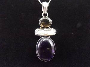 lot 5 image: .925 Sterling Silver Amethyst Cabochon, Mother of Pearl, Smokey Quartz Statuette Pendant Necklace
