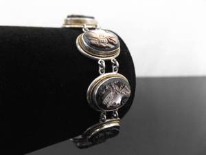 lot 27 image: .800 Sterling Silver Carved Shell Cameo Bracelet