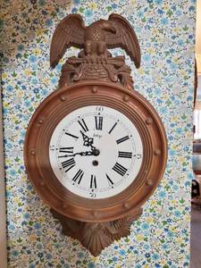 Two Wall-hanging Clocks And A Wall-hanging Mirror