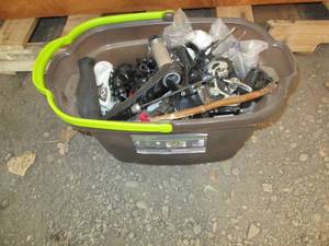 Plastic bucket full of assorted bic...