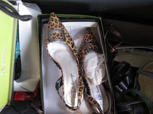 Large tote on wheels containing sev...