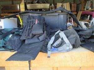Covered rolling storage tote filled...