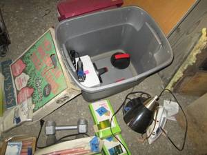 Non-covered storage tote filled wit...